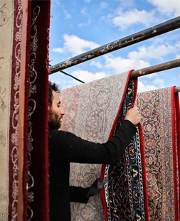 خشک کردن قالی در قالیشویی احمدآباد مشهد